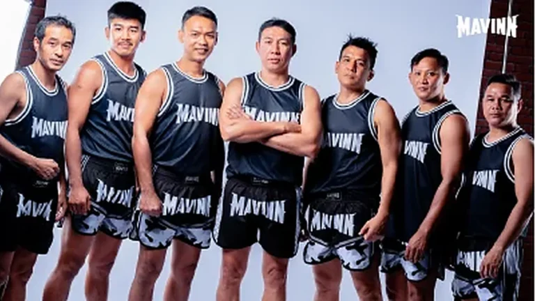 Home The MAVINN Muay Thai team lined up together in matching gym kit