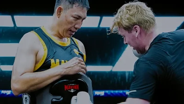 Home MAVINN trainer coaching a student through a pad round